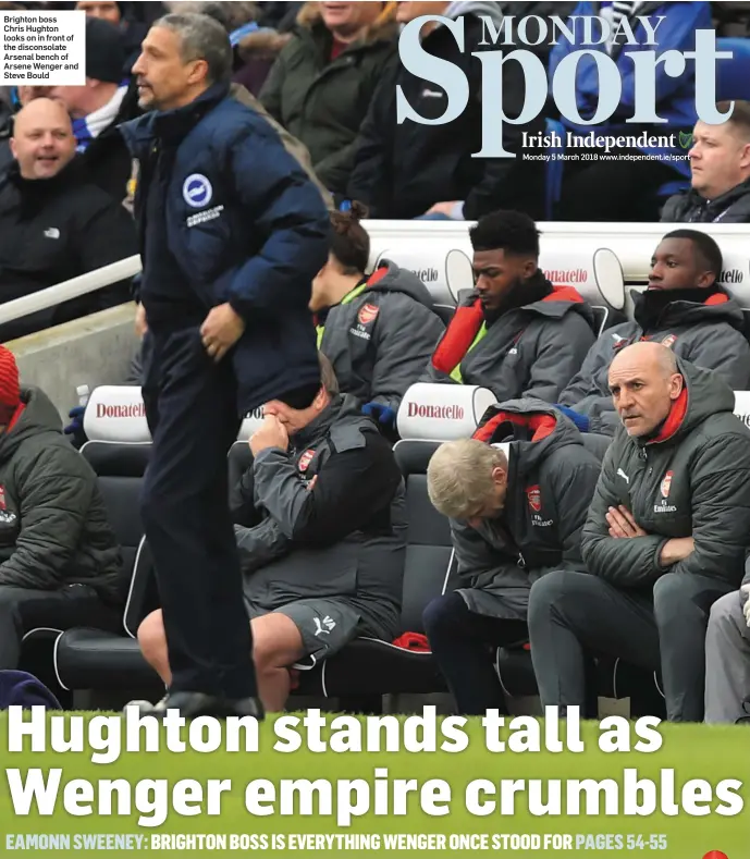  ??  ?? Brighton boss Chris Hughton looks on in front of the disconsola­te Arsenal bench of Arsene Wenger and Steve Bould