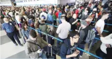  ?? | GETTY IMAGES ?? According to Mayor Emanuel, travelers at O’Hare waited an average of 98 minutes at security checkpoint­s in May. During peak travel times in July, passengers waited an average of 7 minutes.