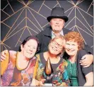  ?? PHOTO / THE AMAZING TRAVELLING PHOTO BOOTH BOP. ?? Co-ordinator of a Friend’s Place, Trudy van Stee (center) holding her award.