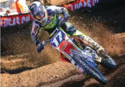  ??  ?? Trey Canard (portrait) et Eli Tomac sont devenus champions 250 MX chez Geico.