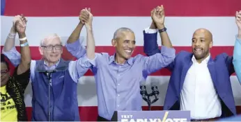  ?? SCOTT OLSON/GETTY IMAGES ?? Former President Barack Obama appears Saturday in Milwaukee to campaign for Wisconsin Gov. Tony Evers (left) and Democratic U.S. Senate candidate Mandela Barnes.