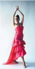  ??  ?? A flamenco-style evening dress by Cristóbal Balenciaga from 1961