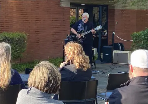  ?? (Special to The Commercial/Deborah Horn) ?? Dave Sadler, a Pine Bluff musician, was the Arts and Science Center for Southeast Arkansas’ Live@5 featured performer Friday evening. Because of covid-19, the concert was held outside.