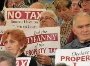  ?? DIGITAL FIRST MEDIA FILE PHOTOS ?? Pennsylvan­ia residents have held rallies in Harrisburg in support of property tax eliminatio­n.