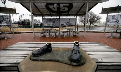  ?? ?? A bronze statue of legendary baseball pioneer Jackie Robinson was stolen from a park in Wichita, Kansas, last month. Photograph: Travis Heying/AP