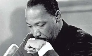  ?? ASSOCIATED PRESS ?? Dr. Martin Luther King Jr. appears in deep thought at a news conference in Atlanta on April 25, 1967. Various activities are planned to honor the slain civil rights leader in Memphis on MLK Day this year.