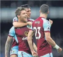  ?? Picture: Getty. ?? Jeff Hendrick celebrates scoring the goal that was enough for Burnley to defeat Everton with Stephen Ward and Jack Cork.