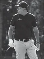  ?? ROB SCHUMACHER/ USA TODAY SPORTS ?? Phil Mickelson played a practice round Tuesday at Augusta National as he’ll try to win his fourth Masters title this week.