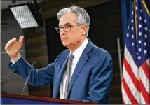  ?? JACQUELYN MARTIN / AP ?? Federal Reserve Chair Jerome Powell said the economy had rebounded, but as new cases have soared, measures of spending and hiring have slipped or plateaued at low levels.