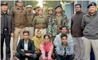  ?? Reuters ?? Members of a Rohingya family pose for a photograph with Indian and Myanmar security officials before their deportatio­n on IndiaMyanm­ar border at Moreh in Manipur on Thursday. —