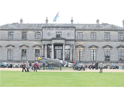  ?? Picture: George Mcluskie. ?? Supercars and vintage vehicles outside Broomhall House in Charlestow­n, near Dunfermlin­e, to mark 100 years of the RAF. The convoy arrived at the house of WWII bomber command veteran the Earl of Elgin.