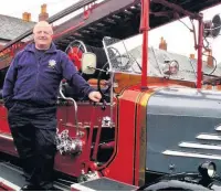  ??  ?? ●●Danny Murphy on a Dennis fire engine at Rochdale Fire Station Museum