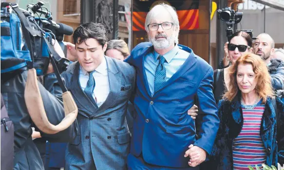  ?? Picture: AAP IMAGE ?? Australian actor John Jarratt (centre), with wife Rosa Miano and lawyer Bryan Wrench (left) leave the Downing Centre Court in Sydney yesterday.