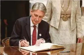  ?? EPA PIC ?? Chancellor of the Exchequer Philip Hammond says Britain will honour its legal liabilitie­s to the European Union.