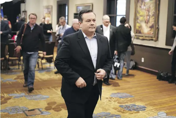  ?? GAVIN YOUNG ?? Newly elected PC leader Jason Kenney leaves his first news conference at the Hyatt Regency Hotel in Calgary on Sunday. Kenney remains adamant that any new Alberta conservati­ve party would take anyone as a member who considers himself or herself a...