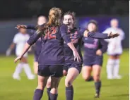  ?? Stanford Photo ?? Stanford’s Kyra Carusa (12) and Andi Sullivan celebrate Carusa’s goal against Auburn.