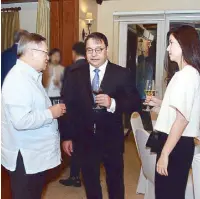  ??  ?? Finance Secretary Sonny Dominguez with Lorenzo Tan and Kara Aguas.