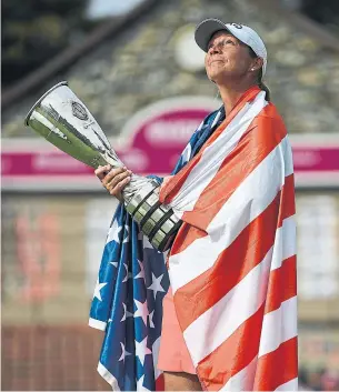  ?? JEAN-PIERRE CLATOT GETTY IMAGES ?? Winning the Evian Championsh­ip on Sunday gaver Angela Stanford her first major title. The 40-year-old American came close in 2003, when she was runner-up at the U.S. Women’s Open.