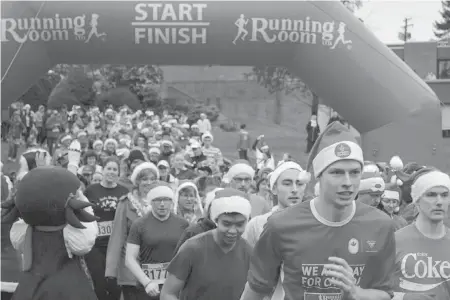  ?? JILL FITZ HIRSCHBOLD ?? About 270 people took part in this year’s Santa Shuffle, raising more than $8,700 to help families in need.