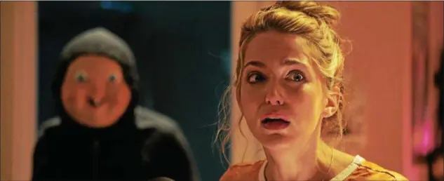  ?? UNIVERSAL PICTURES ?? Tree, portrayed by Jessica Rothe, is dying — again and again — on her birthday in “Happy Death Day.”