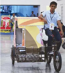  ??  ?? Pedicabs in motion from the museum, and ready to ply the streets and eskinitas of Manila