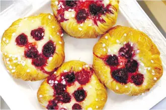  ??  ?? Raspberry cream cheese danishes are among the sweet treats at Grainz.