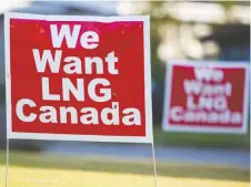  ?? BEN NELMS/BLOOMBERG ?? Creating a world-class industry of LNG export plants would stop the building of more coal-burning plants in developing nations, says Diane Francis. Above, signs promote the LNG Canada project.