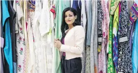  ??  ?? Nesreen opened a clothing boutique in Riyadh with savings from her job as an auditor.