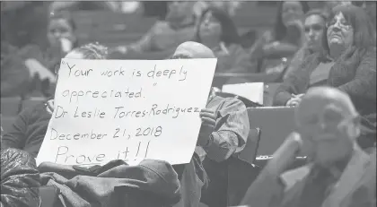  ?? BRAD HORRIGAN/HARTFORD COURANT ?? A sign at a Hartford Board of Education meeting at Bulkeley High School Tuesday evening expresses a desire for more support for teachers and administra­tors.