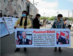  ?? AP ?? Former Afghan interprete­rs for US and Nato forces protest in front of the US Embassy in Kabul yesterday. They are among those who fear being killed after Western troops leave Afghanista­n.