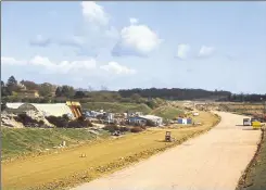  ?? Picture: Neville Marsh ?? The section of the M20 nearing completion in 1980 beside the once grand house named Crooksfoot