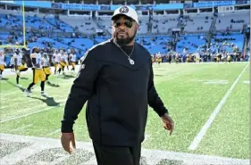  ?? Grant Halverson/Getty Images ?? Steelers head coach Mike Tomlin looks on before a game against the Panthers at Bank of America Stadium on Dec. 18 in Charlotte, N.C.