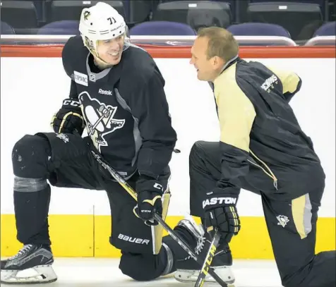  ?? Peter Diana/Post-Gazette ?? Sergei Gonchar, right, earned a promotion to full-time assistant in part because of his work with the Penguins defensemen.
