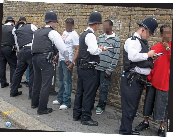 ?? Picture: ?? Police powers: Officers stop and search youths at the Notting Hill Carnival in 2009