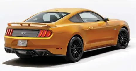  ?? FORD PHOTOS ?? Out back, the Mustang gets a new set of tail lights and trunk appliqué that complement a revised rear bumper replete with available quad exhaust tips.