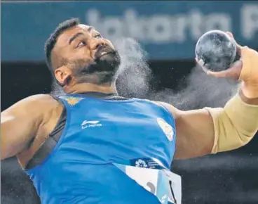  ?? AP ?? Tajinderpa­l Singh Toor in action during the men's shot put final on the opening day of the athletics competitio­n.