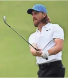  ??  ?? Tommy Fleetwood hits a shot on the 17th hole during the third round the British Open on Saturday. THOMAS J. RUSSO/USA TODAY SPORTS