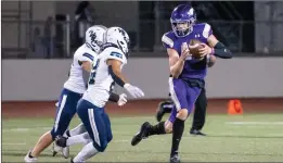  ?? Bobby Block/The Signal ?? Valencia High School’s Tyler Voss (11) attempts to dodge two pursuing West Ranch players during a game on Oct. 1.