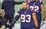  ?? Stew Milne / Associated Press ?? Patriots defensive lineman Lawrence Guy before a Nov. 15 game against the Ravens.