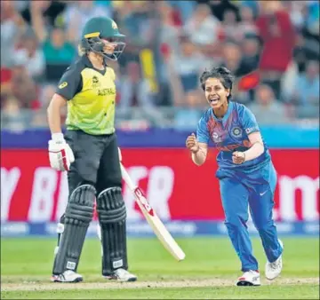  ?? GETTY IMAGES ?? Poonam Yadav (right) after dismissing Australia’s Ellyse Perry during the Women's T20 World Cup opener on Friday.