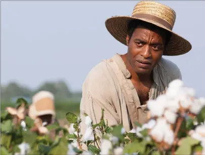  ??  ?? Chiwetel Ejiofor as Solomon Northup in 12 Years A Slave; Dev Patel in The Personal History of David Copperfiel­d