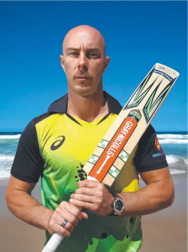  ??  ?? SEE BALL, HIT BALL: Aussie cricketer Chris Lynn at Surfers Paradise ahead of tonight’s T20 Internatio­nal on the Gold Coast. Picture: ADAM HEAD