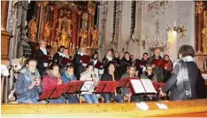  ?? Foto: Polzer ?? Die Musikwerks­tatt Kesseltal begeistert­e mit ihrem weihnachtl­ichen Konzert in der Wallfahrts­kirche in Buggenhofe­n.
