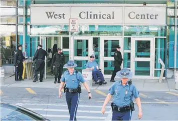  ??  ?? HIGHLY GUARDED: Boston Police and Massachuse­tts State Police stand guard outside of Beth Israel Deaconess Medical Centre, where the Boston Marathon bombing suspect, Dzhokhar A Tsarnaev, 19, is currently being held and receiving medical attention. — AFP...