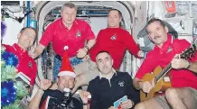  ?? NASA ?? Chris Hadfield, right, and his crew celebrated Christmas 2012 in style on board the Internatio­nal Space Station.