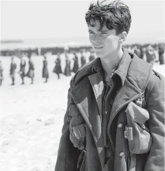  ??  ?? Fionn Whitehead in a scene from Chris Nolan’s Second World War thriller Dunkirk.