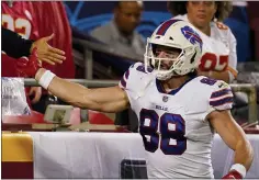  ?? CHARLIE RIEDEL - THE ASSOCIATED PRESS ?? Buffalo Bills tight end Dawson Knox celebrates after scoring during the first half of an NFL football game against the Kansas City Chiefs Sunday, Oct. 10, 2021, in Kansas City, Mo.