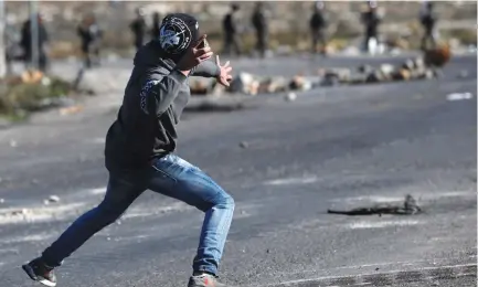  ?? (Reuters) ?? ‘TERRORISTS LOB rocks more than two-dozen times per day at Israeli vehicles driving on Highway 60, the main north-south highway that runs through the hills of Samaria.’