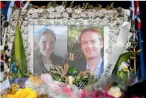  ?? PHOTO: GETTY IMAGES ?? A tribute to Lindt Cafe siege victims Katrina Dawson and Tori Johnson in Sydney’s Martin Place. The inquest into the siege saw New South Wales Coroner Michael Barnes hear evidence from 123 witnesses over 109 days.