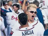  ?? JOHN BAZEMORE/AP ?? Joc Pederson celebrates his three-run home during the Braves’ 3-0 victory over the Brewers on Monday in Atlanta. The Braves lead the NLDS 2-1.